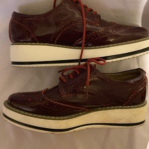 Deep red patent leather platform shoes